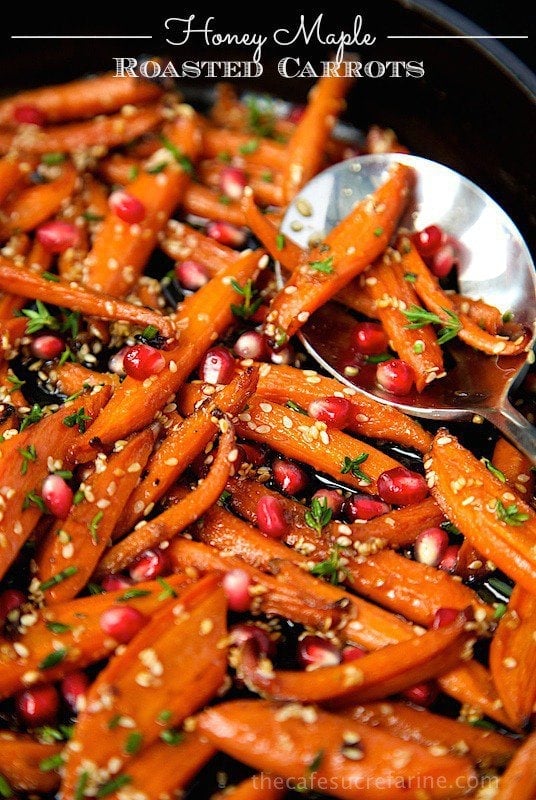 Honey Maple Roasted Carrots - these are like candy, everyone always wants second helpings! This recipe definitely transforms everyday carrots into something spectacular!