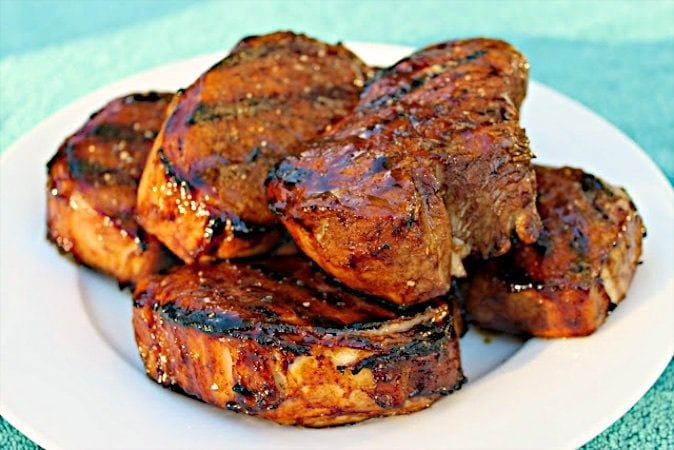 These Grilled Pork Chops with Molasses Balsamic Glaze are just amazing! Juicy, tender, full of flavor and just plain delicious!