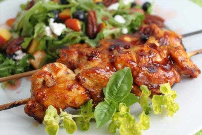 Grilled Chicken Kabobs - definitely one of our favorite grilled chicken recipes EVER! There is a secret ingredient included that you wouldn't expect and it makes the chicken so moist and full of flavor that you'd never believe you're eating breast meat which always tends to dry out on the grill!