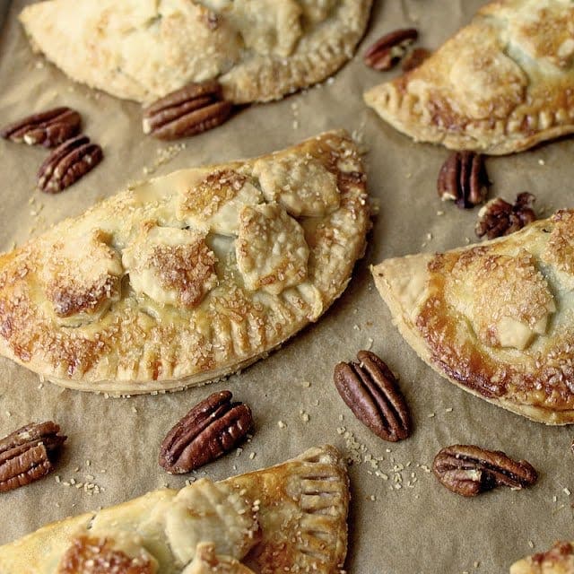 Caramel-Pecan Hand Pies - oh my word! These are crazy delicious and such a fun alternative to pecan pie.