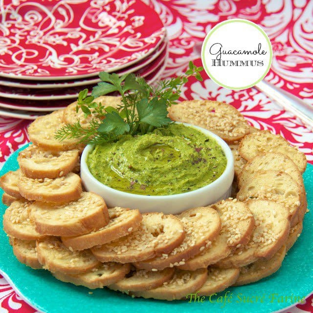 Guacamole Hummus - a delicious combination of guacamole and hummus. You'll be making this healthy dip over and over per request! Everyone seems to love it.