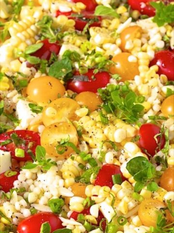 Israeli Couscous and Orzo Salad - The most delicious pasta salad ever with sweet cherry tomatoes, fresh mozzarella and lots of wonderful fresh herbs. Everyone loves this one!