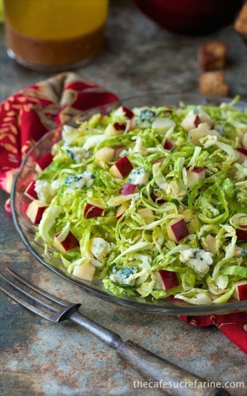 Shaved Brussels Sprouts and Apple Salad with Cider Vinaigrette - a delicious, rustic, fall salad with tons of flavor. The cider vinaigrette harkens back to gorgeous apple orchards and trees laden with bright, crisp, sweet apples.