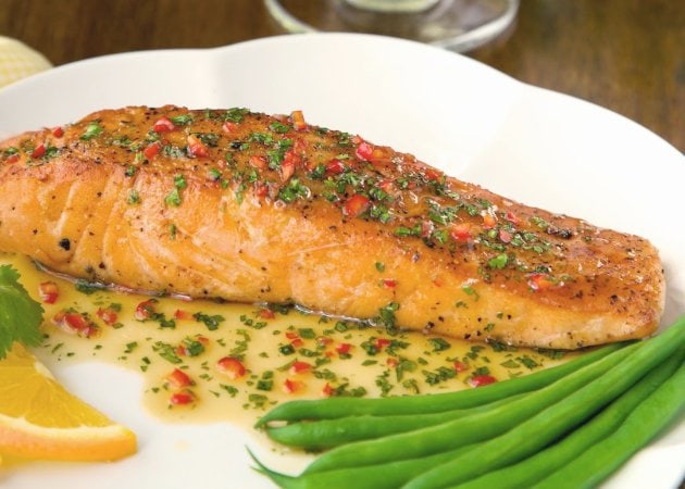 Pan-Seared Salmon with Orange-Coconut Sauce - This one is as delicious as it looks! The sweet and spicy sauce adds an amazing layer of flavor to the salmon.