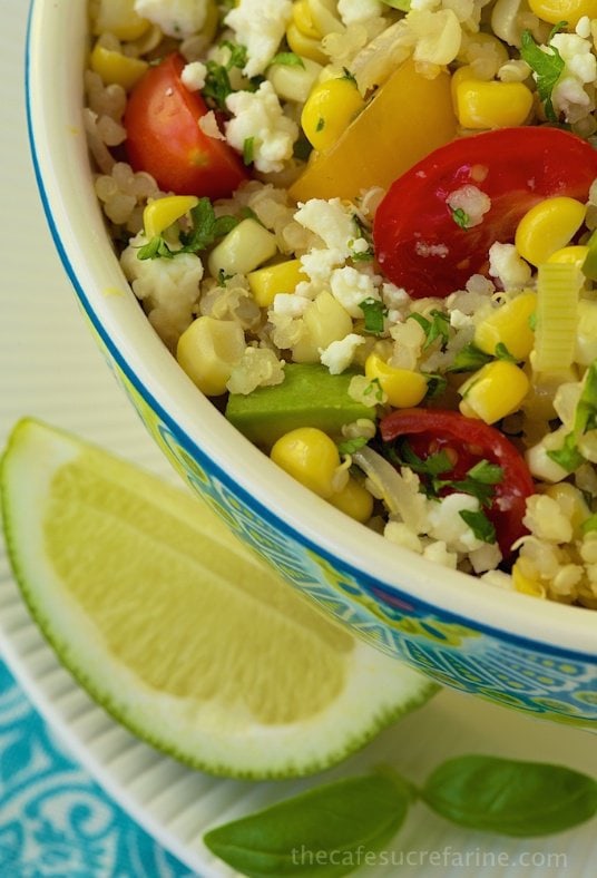 Fresh Corn and Avocado Quinoa Salad -Take one bite and you'll be amazed at the bright, delicious flavor. There's never any left in the bowl!