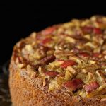 Close up vertical picture of sticky apple pecan cake