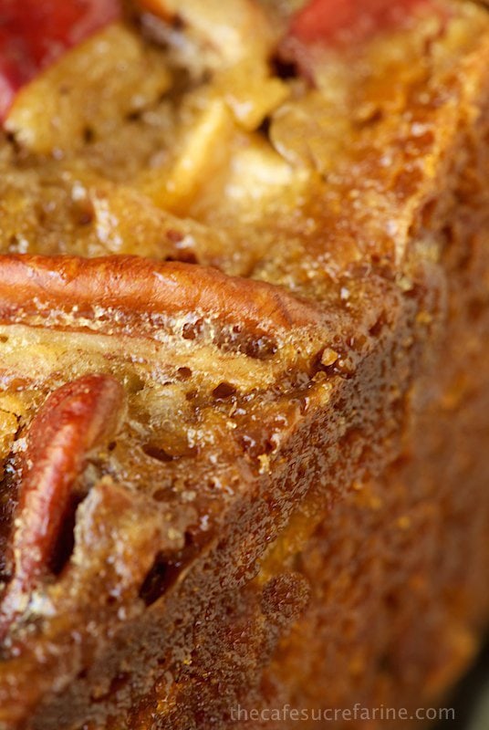 Sticky Apple Pecan Cake - this moist, buttery autumn-inspired confection is loaded with apples in the fabulous warm-spiced cake, as well as adorning the luscious pecan topping. Just before it emerges from the oven, it's brushed with a sweet, sticky, maple glaze, making it beyond irresistible! 
