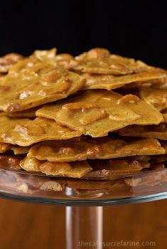 Easy Cashew Curry Brittle - just like peanut brittle but way better! It's a deep golden-hued candy with cashews and a touch of curry which adds a wonderful depth of flavor. Make it in minutes - in the microwave!