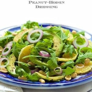Orange and Avocado Salad - fresh and delicious with sweet oranges, creamy avocado, crunchy peanuts and the most delicious sweet-salty-spicy dressing. You'll want to pour it over everything!