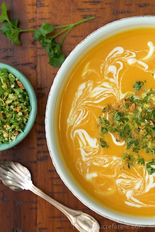 Thai Inspired Carrot and Yellow Pepper Soup - this bright, fragrant soup is loaded with healthy ingredients and bursting with fabulous flavor! It's great as an appetizer soup or for lunch or casual dinners.
