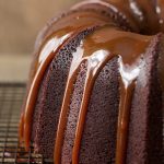 Irish Chocolate Bundt Cake with Caramel Glaze - this rich, decadent cake is super easy to throw together, no mixer necessary! It has a few fun secret ingredients too, don't worry, not anchovies or anything weird like that!