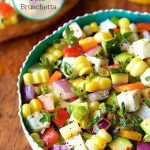 Farmer's Market Feta Bruschetta - a fresh, delicious appetizer that's always a hit and is super adaptable. Use whatever veggies you've got in the fridge!