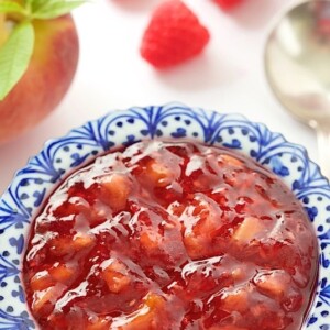 Peach Raspberry Freezer Jam -take 30 minutes to throw together a batch of this yummy jam! It's really easy and you'll be thanking yourself when the cold winds blow!