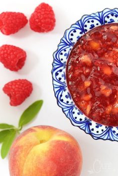 Peach Raspberry Freezer Jam -take 30 minutes to throw together a batch of this yummy jam! It's really easy and you'll be thanking yourself when the cold winds blow!