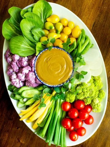 This spicy-sweet Asian-inspired, Easy Peanut Sauce is super simple. Just throw everything (including the secret ingredient) in the blender, that’s it! #peanutsauce #easypeanutsaucerecipe #asianfood #easyappetizers