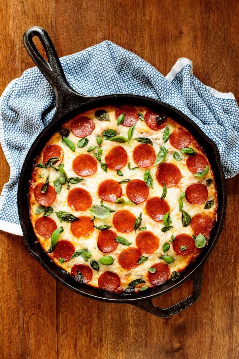 Vertical overhead photo of a Pepperoni Deep Dish Pizza made with Easy Deep Dish Pizza Dough.