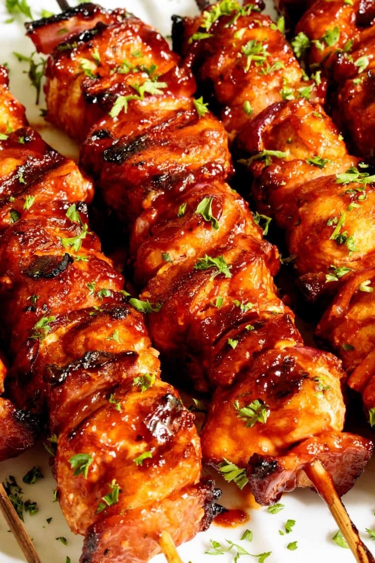 Vertical close up picture of Bacon Bourbon Barbecue Chicken Skewers