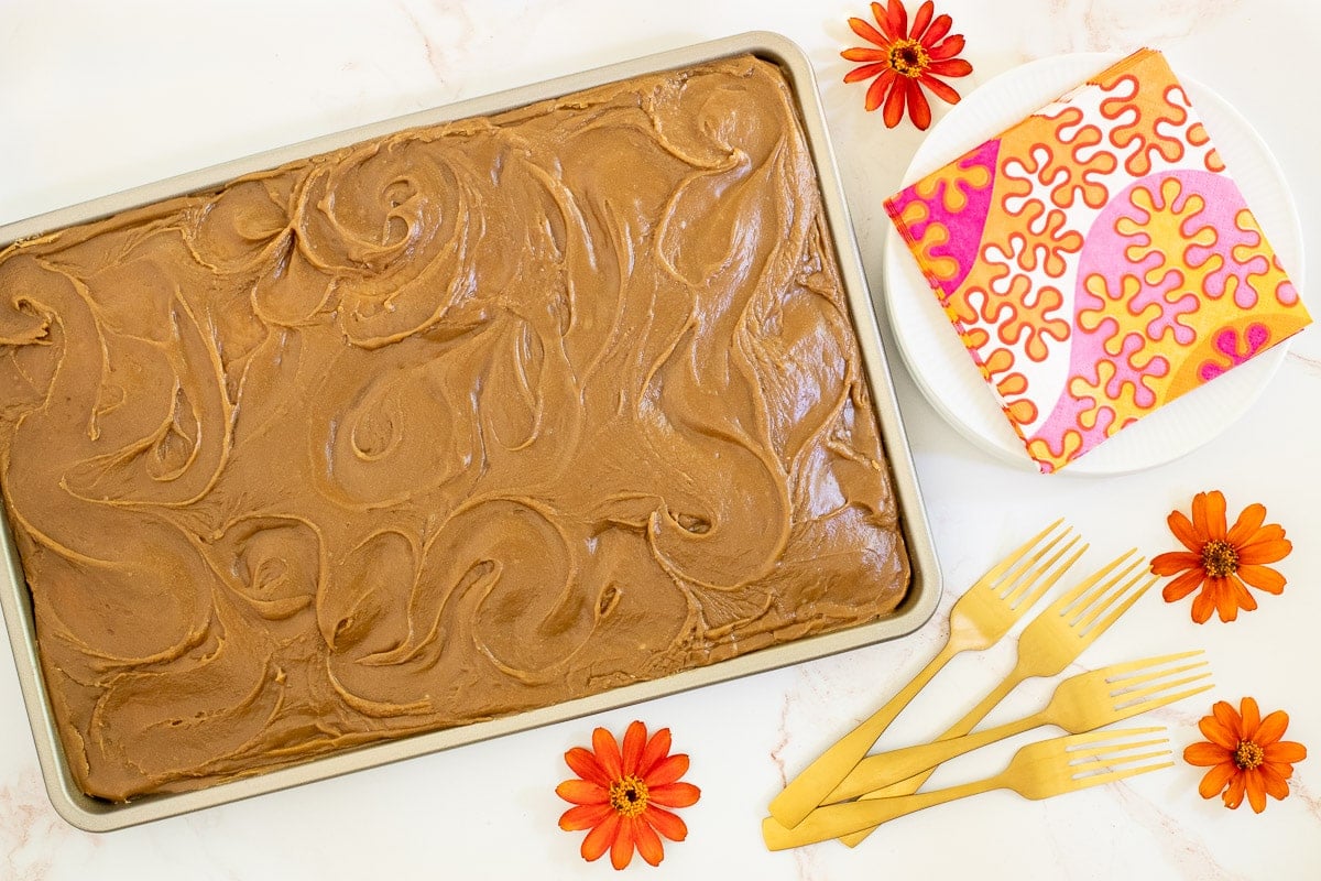 Horizontal overhead photo of a Ridiculously Easy Caramel Buttermilk Sheet Cake with caramel icing.