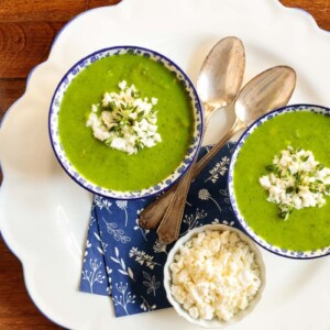 Horizontal overhead photo of bowls of Ham and Fresh Pea Soup.