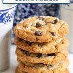 Vertical extreme closeup photo of a stack of the BEST Chocolate Chip Cookies with a text graphic title at the top of the photo.