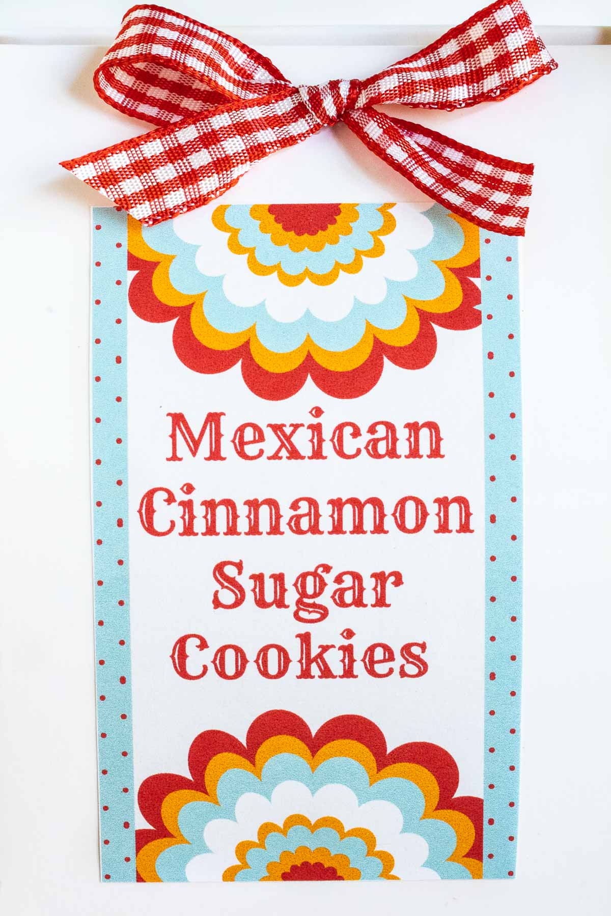 Vertical extreme closeup of a custom gift label for Mexican Cinnamon Sugar Shortbread Cookes.