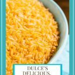Vertical closeup photo of a bowl of Dulce's Delicious, Easy Mexican Rice with a text title graphic at the bottom of the photo.