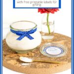 Vertical photo of a glass Weck jar of French Vanilla Sugar (Sucre Vanillé) with custom labels for gift giving.