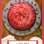 Vertical overhead photo of a Upside Down Plum Yogurt Cake on a galvanized cake plate on a wood table.