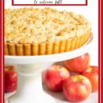 Vertical photo of a Easy French Apple Tart on a white pedestal serving plate.