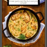 Vertical overhead photo of French Mustard Chicken Breasts (Poulet à la Moutarde Française) in a black cast iron skillet on a wood table.