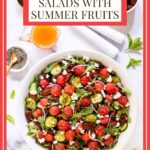 Vertical overhead photo of a Watermelon Arugula Salad with Pepper Jelly Dressing in a white serving bowl with a title graphic at the top of the photo.