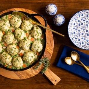 Horizontal overhead photo of a cast iron pot filled with Easy Chicken and Dumplings.