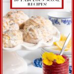Vertical photo of a batch of Ridiculously Easy Lemon Poppy Seed Scones on a white serving plate with a jar of jam in the foreground.