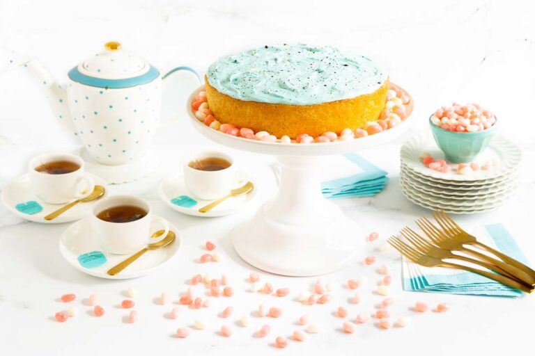 Horizontal photo of a Vanilla Malt Cake with Robin's Egg Buttercream.
