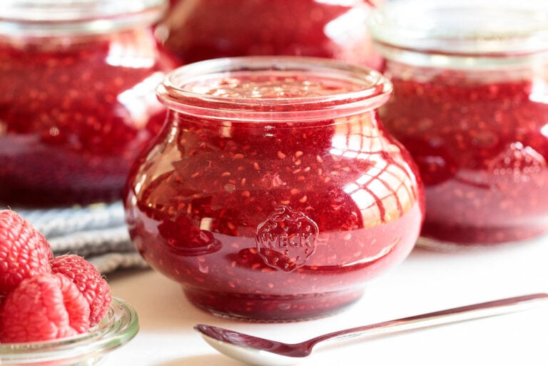Raspberry Freezer Jam in glass jars. 