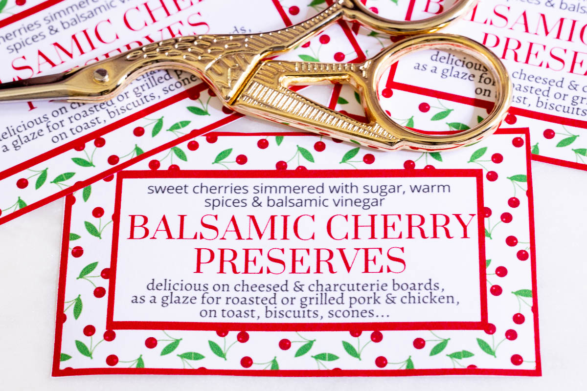Horizontal closeup photo of a custom label for Balsamic Sweet Cherry Preserves for gift giving.