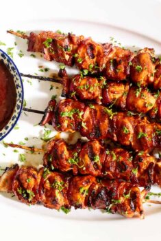 Horizontal overhead photo of Barbecued Bacon Bourbon Chicken Skewers