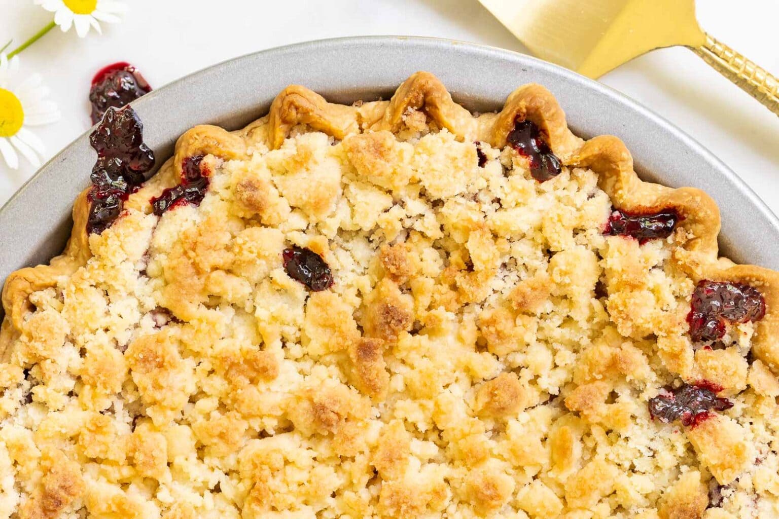 Easy Blackberry Crumble Pie - thecafesucrefarine.com Horizontal overhead closeup photo of a Easy Blackberry Crumble Pie.