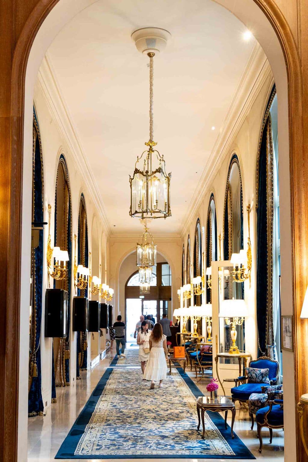 Vertical photo of the interior of the Ritz Hotel in Paris, France.