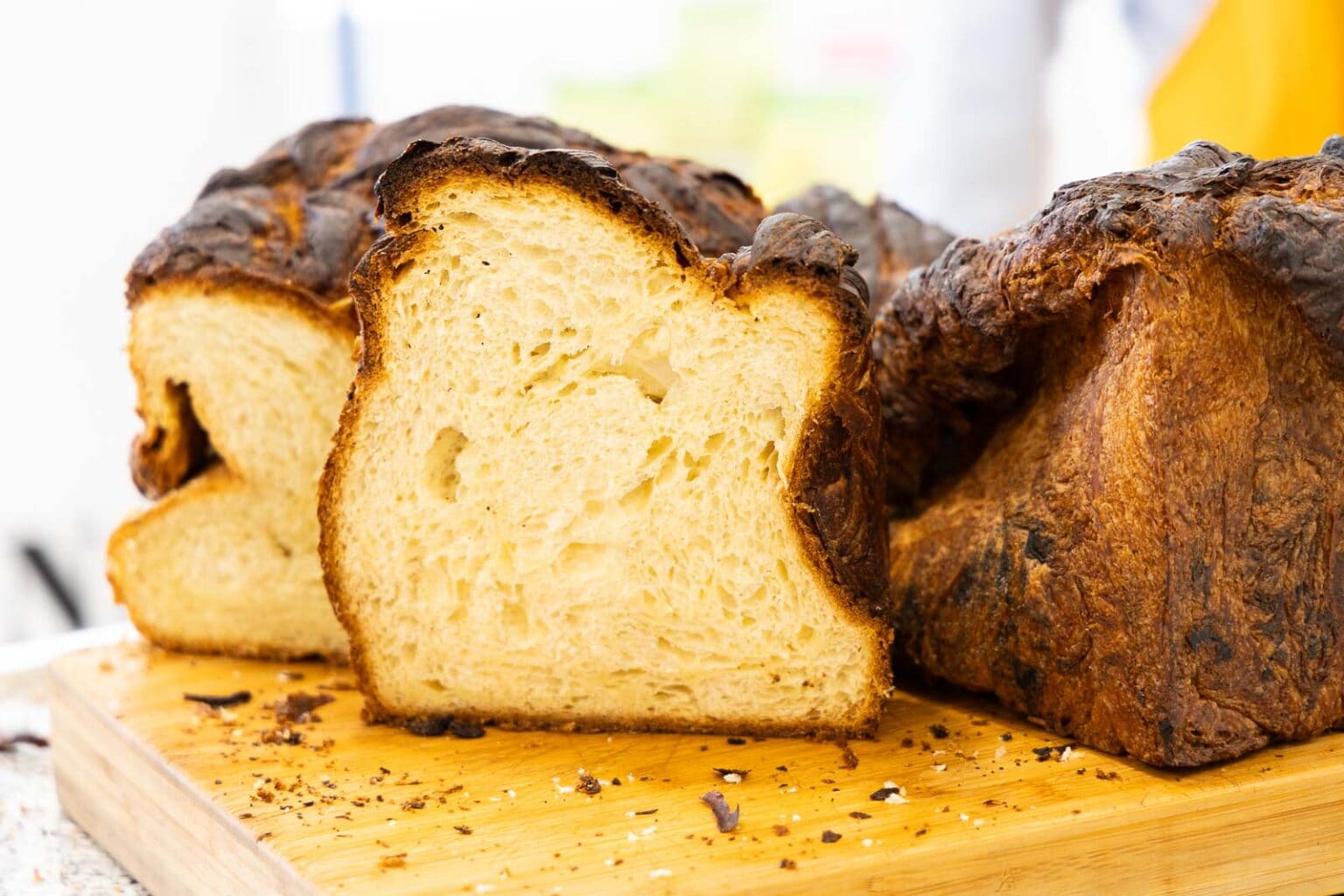 Horizontal closeup photo of a loaf of French Brioche bread from a bakery at La Roche-Guyon, France.