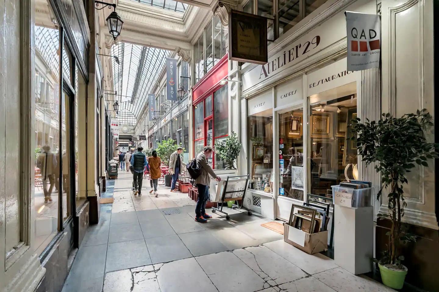 Horizontal photo of one of Paris' gallery shopping/dining areas.