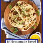 Vertical photo of a stack of naan bread surrounded by cilantro leaves.