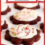 Vertical closeup photo of a batch of Chocolate Shortbread with Almond Buttercream cookies on a red glass serving plate.