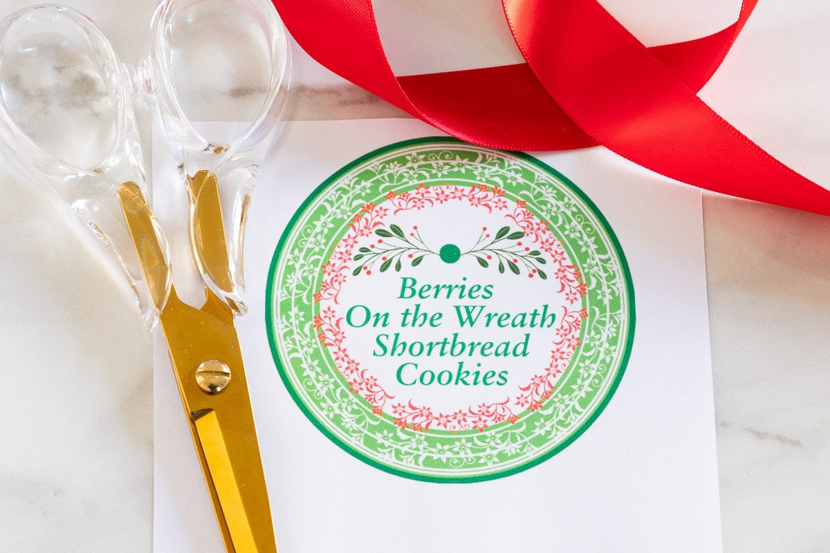 Horizontal closeup photo of a Berries on the Wreath Shortbread Cookies custom label for gift giving.