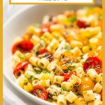 Roasted Tomato Pasta Salad in a white bowl.