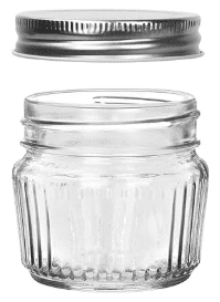 Vintage 4oz fluted jars with a silver lid.