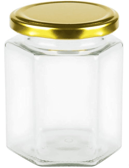 Small glass jar with 5 sides and a thin gold lid.