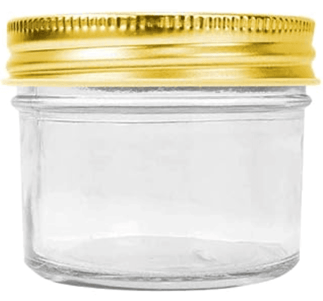 small mason jar with a gold lid.