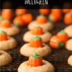 Pumpkin shortbread cookies on a cooling rack.