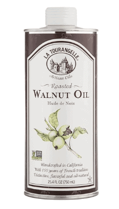 a jar of roasted walnut oil with a picture of a walnut sprig on the front